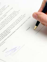 a work contract being signed